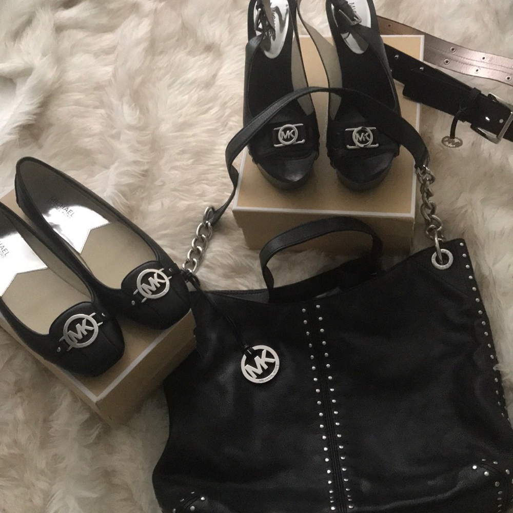 Micheal Kors black leather charm sling shoes .